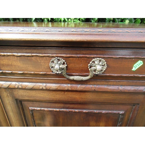 71 - A reproduction mahogany cupboard with two drawers and two cupboards, width 36ins