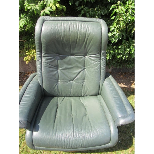 8 - (55) A modern leather effect chair and stool