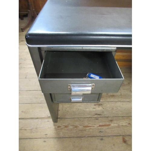 1 - A metal utility style desk, in the manner of Milner , width 48ins, depth 26ins, height 29ins