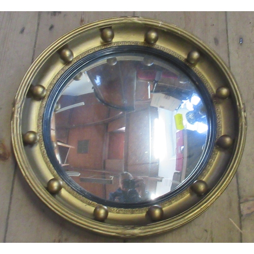 106 - A Regency style mirror, overall diameter 13ins