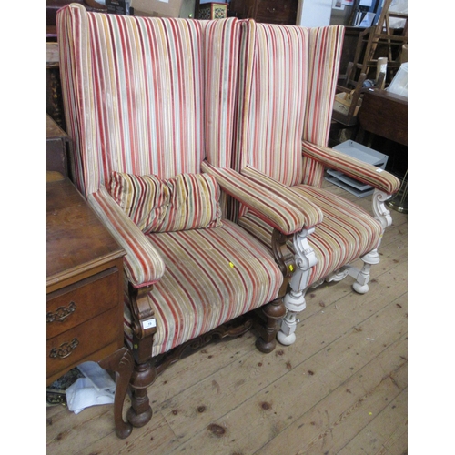 19 - A pair of wing back open arm chairs, 17th century style