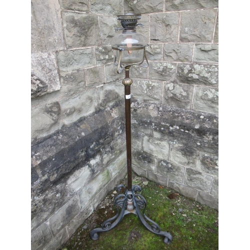 32 - A 19th century wrought iron oil lamp , with telescopic stand