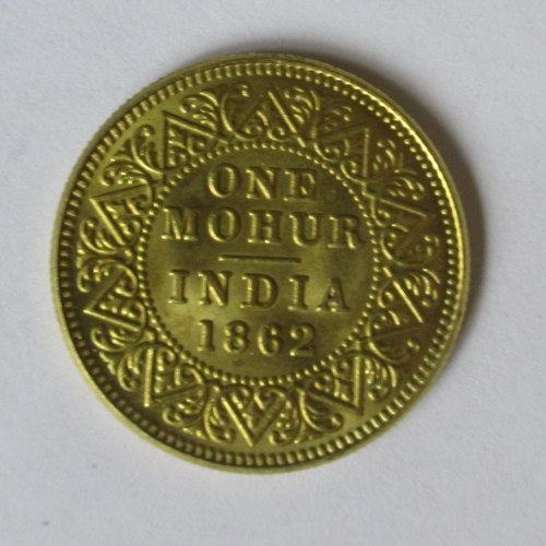 351 - One Mohur, India 1862, a gold coloured coin