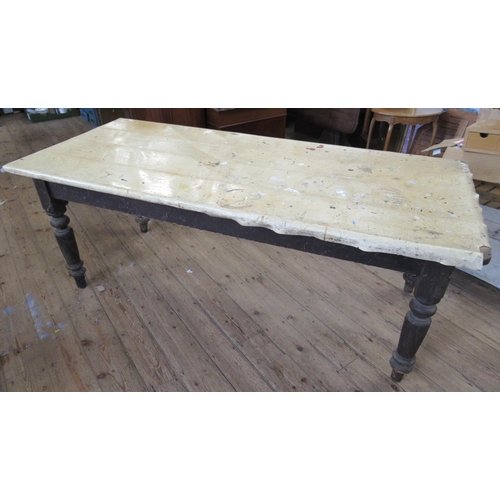 71 - A large scrub top pine kitchen table