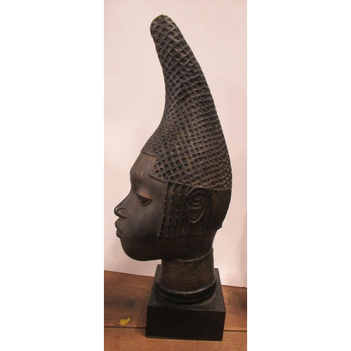 127 - A carved wooden ethnic head, on stand, height 18ins