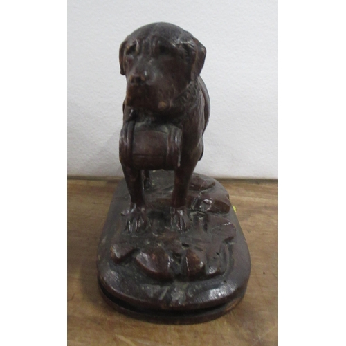 143 - A Black Forest carved wooden model, of a St Bernard dog, height 4.25ins