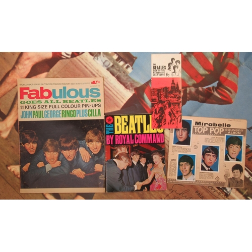 181 - A collection of Beatles ephemera, to include two posters, Reveille Special with facsimile signatures... 