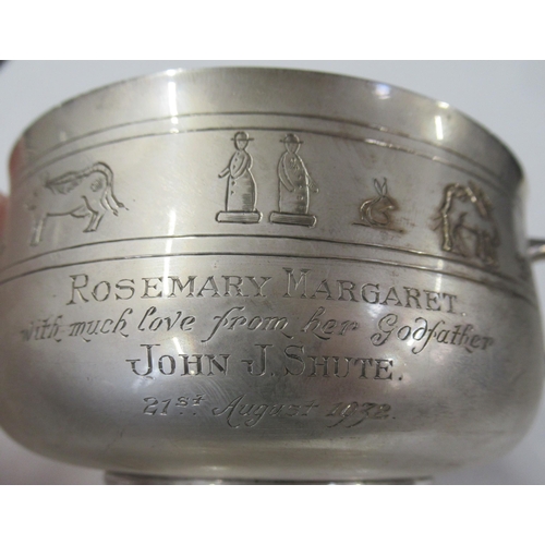 230 - A silver two handled bowl, engraved with Noah's ark, animals, figures and an inscription, weight 7oz