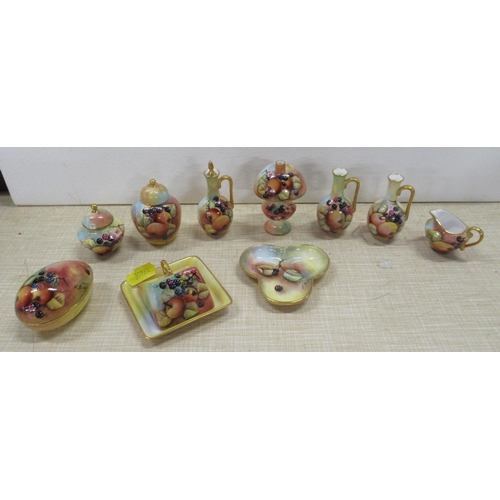 254 - 10 pieces of Caverswall porcelain, decorated with fruit