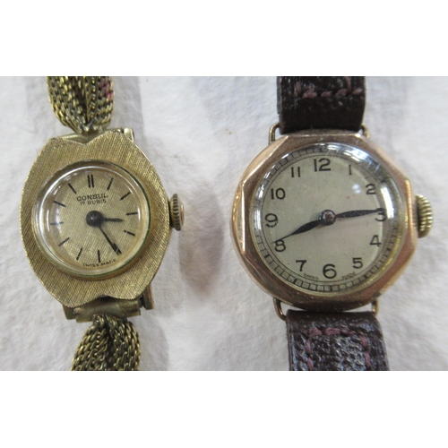 284 - A 9ct gold cased wrist watch, with leather strap, together with another wrist watch and a pocket wat... 