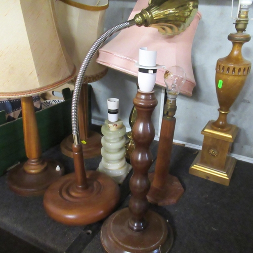 322 - A collection of wooden table lamps