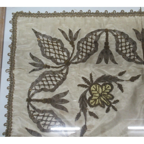 333 - A framed embroidery of silver and gold coloured thread on silk