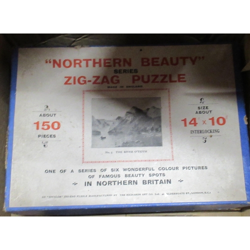 380 - A box of Zigzag wooden jigsaw puzzles