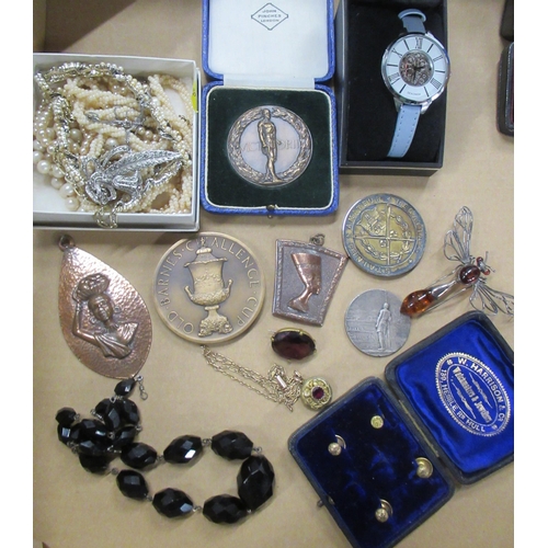 394 - A collection of costume jewellery, medals etc