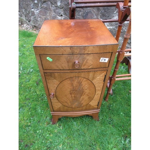 53 - Three towel rails , a rocking chair and a mahogany cabinet