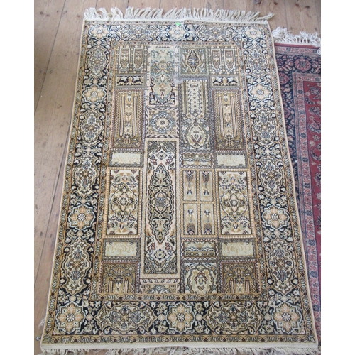 69B - A pink ground rug, 80ins x 55ins, together with two other rugs, 58ins x 36ins and 54ins x 27ins