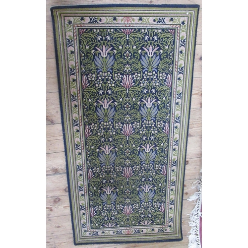 69B - A pink ground rug, 80ins x 55ins, together with two other rugs, 58ins x 36ins and 54ins x 27ins