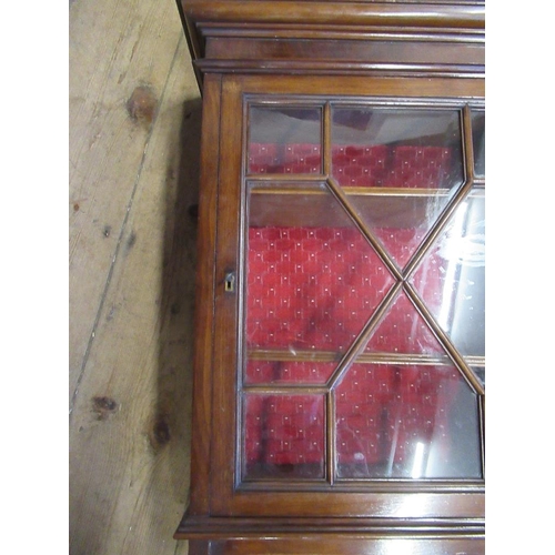 106 - An Edwardian mahogany wall cupboard with astragal glazed door open to reveal two shelves , width 17i... 