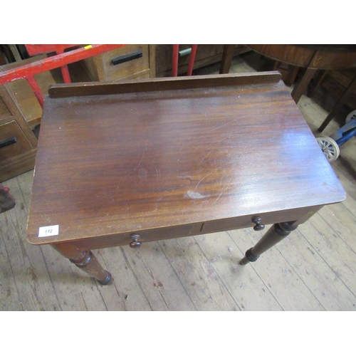 112 - A late 19th century mahogany two door side table raised on turned legs 29ins x 17.5ins x 29ins