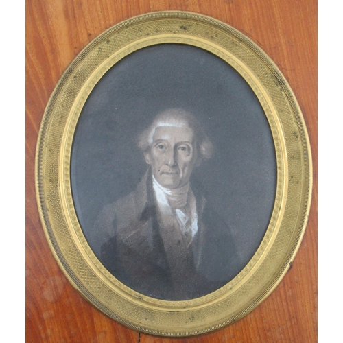 168 - A 19th century Empire style, oval portrait of be-wigged man, maximum diameter 5.5ins