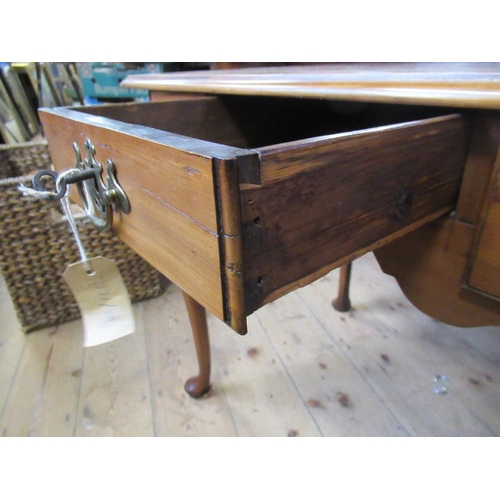 19 - An 18th century Georgian fruitwood three drawer lowboy, standing on cabriole legs, with pad feet, ha... 