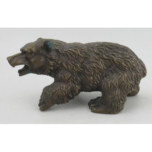 199 - A brass model, of a standing bear, with metal figure of an Insect