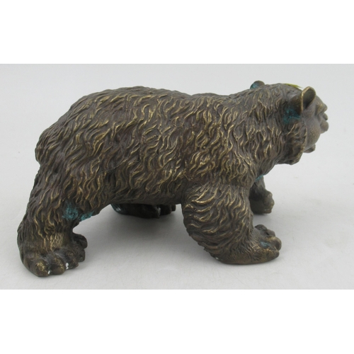 199 - A brass model, of a standing bear, with metal figure of an Insect