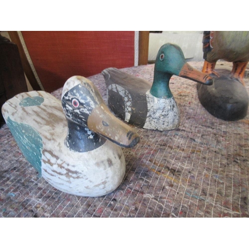 205 - Two decoy ducks, a painted wooden cockerel and a woven reed chicken