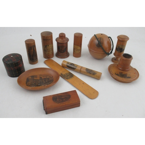 221 - A collection of Mauchline ware, to include an egg timer, cases, etc, all printed with names views an... 