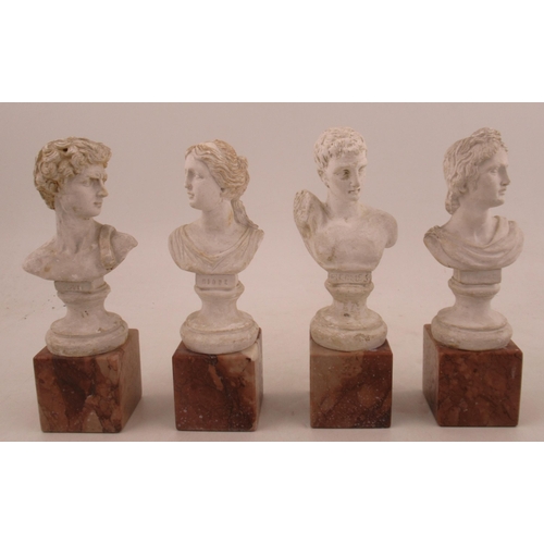 232 - Four Antique Grand Tour plaster busts, of Apollo, Hermes, Nigee and David, raised on marble bases, h... 