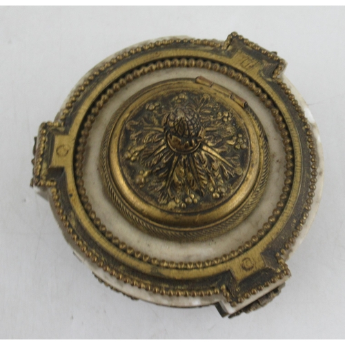 233 - A circular French ormalu and marble inkstand, with a decorated frieze of foliage and swags, raise do... 