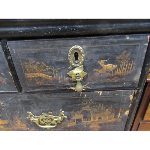 33 - An 18th century lacquered chest of three short drawers over three graduated long drawers raised on l... 