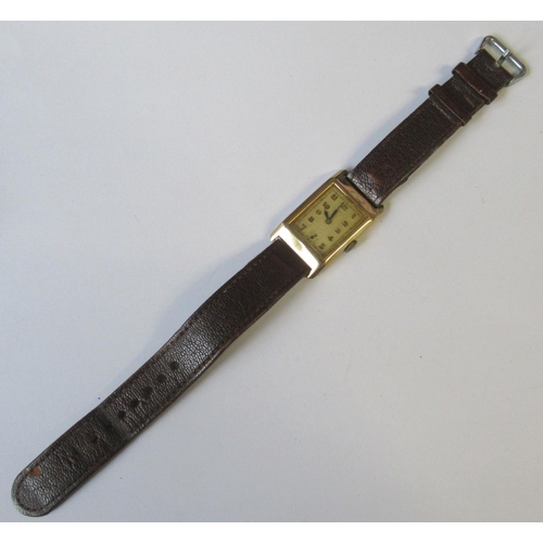 378 - A Vintage 9ct gold cased Gentleman's watch, with gold Arabic numerals to the rectangular dial, leath... 