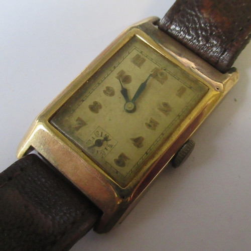 378 - A Vintage 9ct gold cased Gentleman's watch, with gold Arabic numerals to the rectangular dial, leath... 