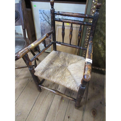 39 - A child's rush seated spindle back arm chair together with an aesthetic movement circular seated chi... 