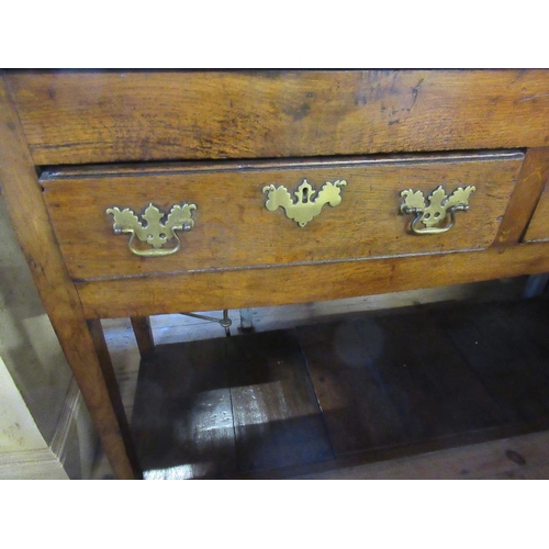 41 - An Antique oak dresser, with two frieze drawers, raised on tapering legs united by shelf below, widt... 