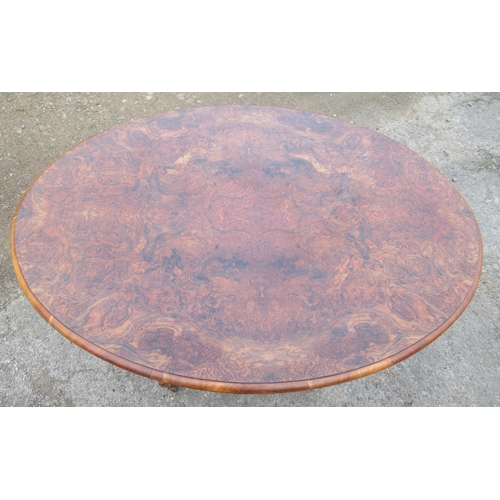 47 - A 19th century oval loo table, with well figured walnut top, width 46ins, depth 35.5ins