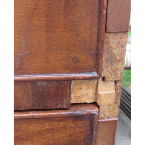 5 - A 19th century mahogany straight front chest, with two drawers over three long drawers, raised on br... 