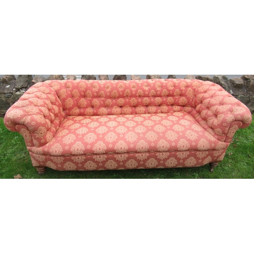 53 - A two seat roll top Chesterfield settee