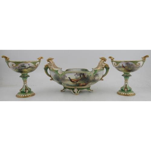 536 - A Royal Worcester Hadley's garniture, comprising a boat shaped centre piece, fully painted with phea... 