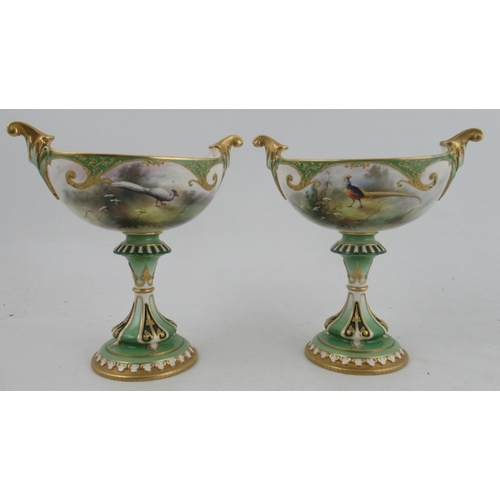 536 - A Royal Worcester Hadley's garniture, comprising a boat shaped centre piece, fully painted with phea... 