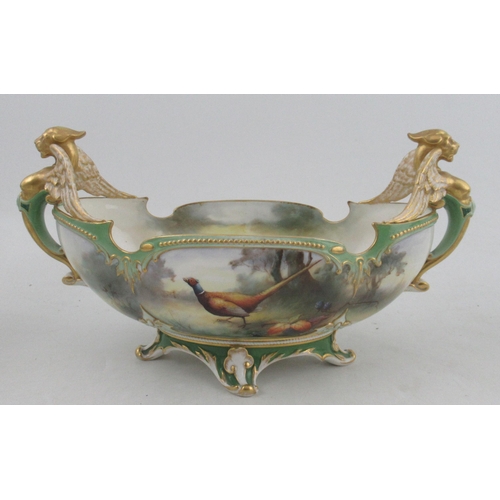 536 - A Royal Worcester Hadley's garniture, comprising a boat shaped centre piece, fully painted with phea... 