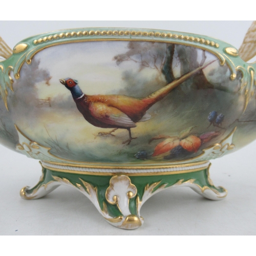 536 - A Royal Worcester Hadley's garniture, comprising a boat shaped centre piece, fully painted with phea... 