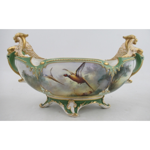 536 - A Royal Worcester Hadley's garniture, comprising a boat shaped centre piece, fully painted with phea... 