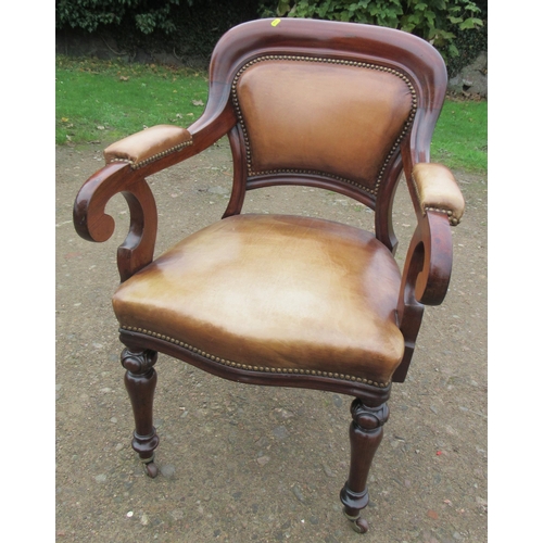 54 - A pair of 19th century mahogany showwood armchairs, with leather upholstery