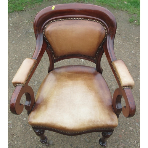 54 - A pair of 19th century mahogany showwood armchairs, with leather upholstery