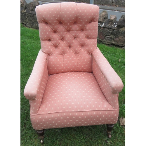 55 - A 19th century pink upholstered arm chair