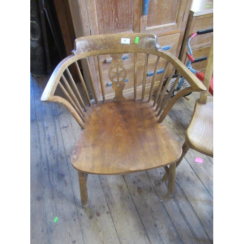 57 - A 19th century lath back Windsor arm chair, a similar single chair and another chair