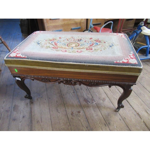 68 - A late 19th century mahogany duet piano stool with raising lid for music and raised on cabriole legs... 