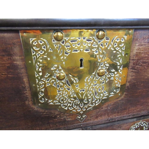 72 - An 18th century Dutch colonial mule chest with plain raising lid and brass studded and pierced mount... 